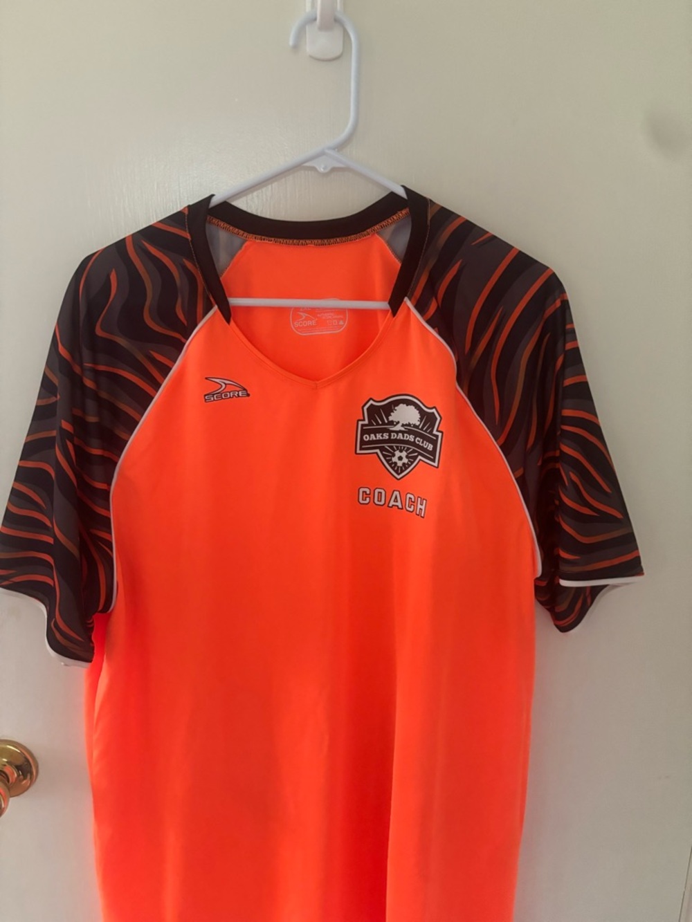 Score Orange Coach Jersey with Black Accent Sleeves